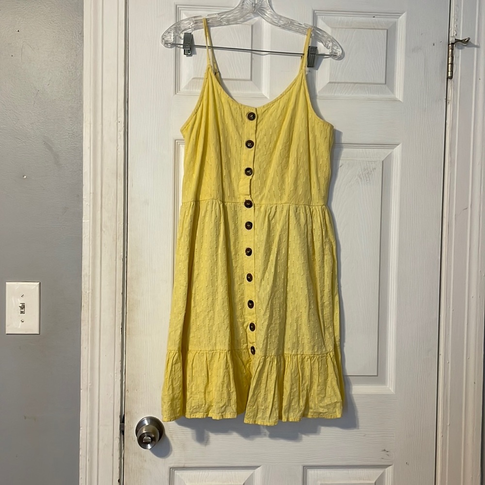 Yellow eyelet dress with ruffled hem